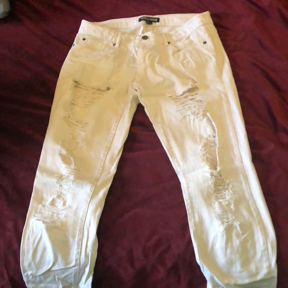 White jeans with slits